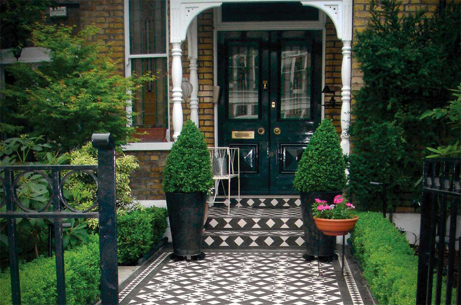 Black and white chequerboard Victorian tiled path in London